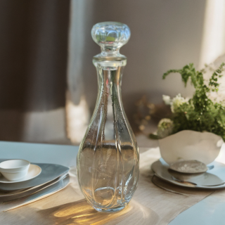 Grande carafe vintage en verre transparent relief quartiers d’orange avec bouchon